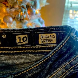 Miss Me blue denim jeans.